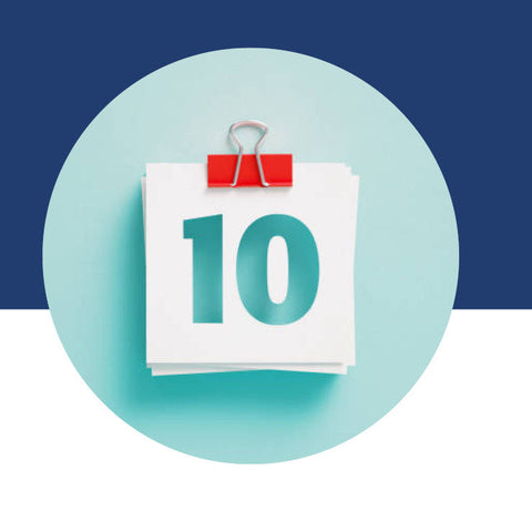 A stack of papers marked with a bold "10" and held together with a red binder clip.