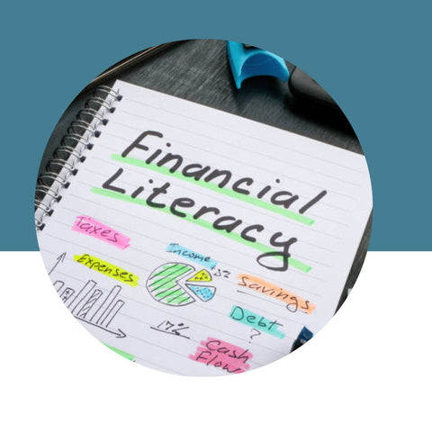 Notepad with 'Financial Literacy' and various terms clipped to it on a blue and white background