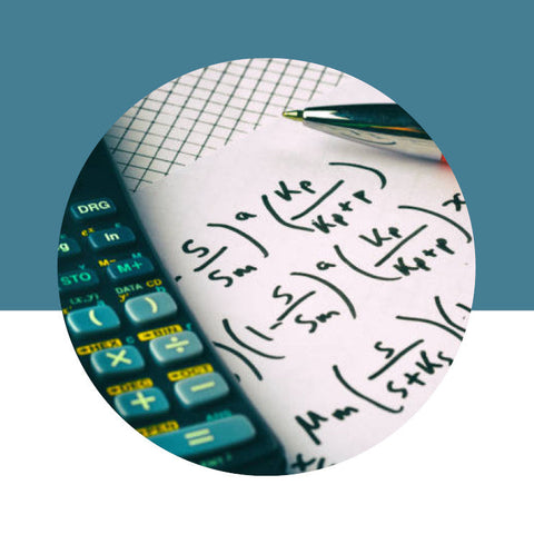 Calculator and piece of paper with mathematical equations on a blue background