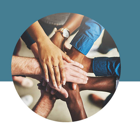 Circles of hands held together on a blue and white background