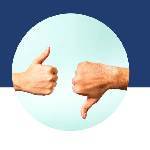 Two hands, one giving a thumbs up and the other a thumbs down.