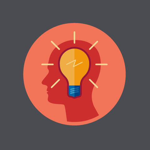 Illustration of a light bulb inside a silhouette of a head.
