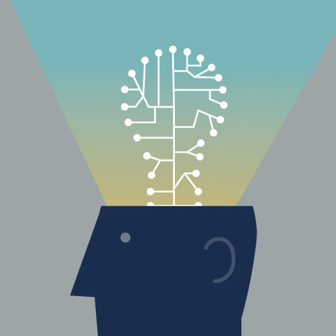 Silhouette of a head with a network-like brain illuminated.