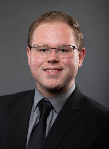 Robbie Day, M.P.A