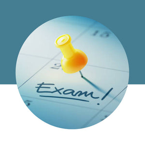 Calendar with 'Exam!' written on it and a pushpin, against a blue background