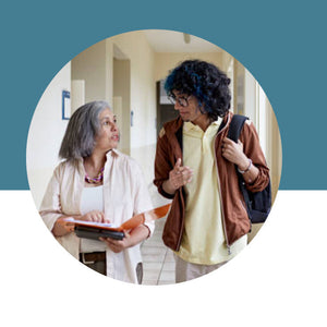 A faculty member holding a binder in conversation with a student wearing a backpack on a teal and white background.