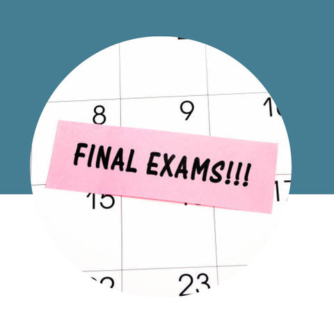 Calendar with a pink sticker indicating 'Final Exams!!!' on a blue background