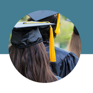 Graduation cap and gown with yellow tassel on a blue and white background