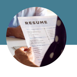 Person holding a resume with a blue background