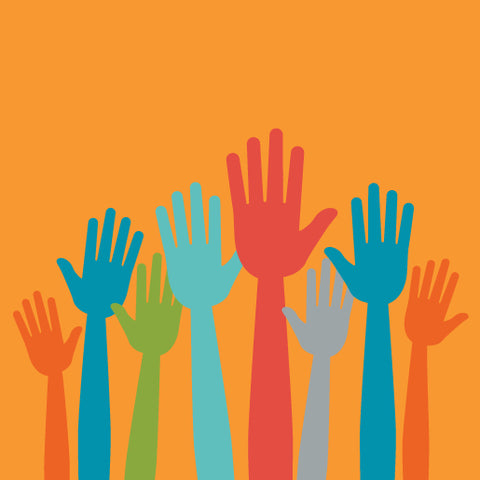 Different colored raised hands on a orange background.