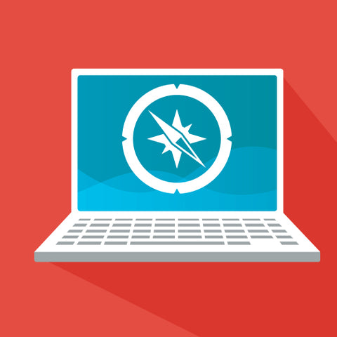 Image of Laptop with a symbol of a Compass on it.