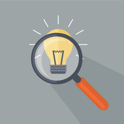 light bulb under magnifying glass icon
