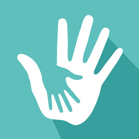 Large white hand supporting a small green hand on a green background.